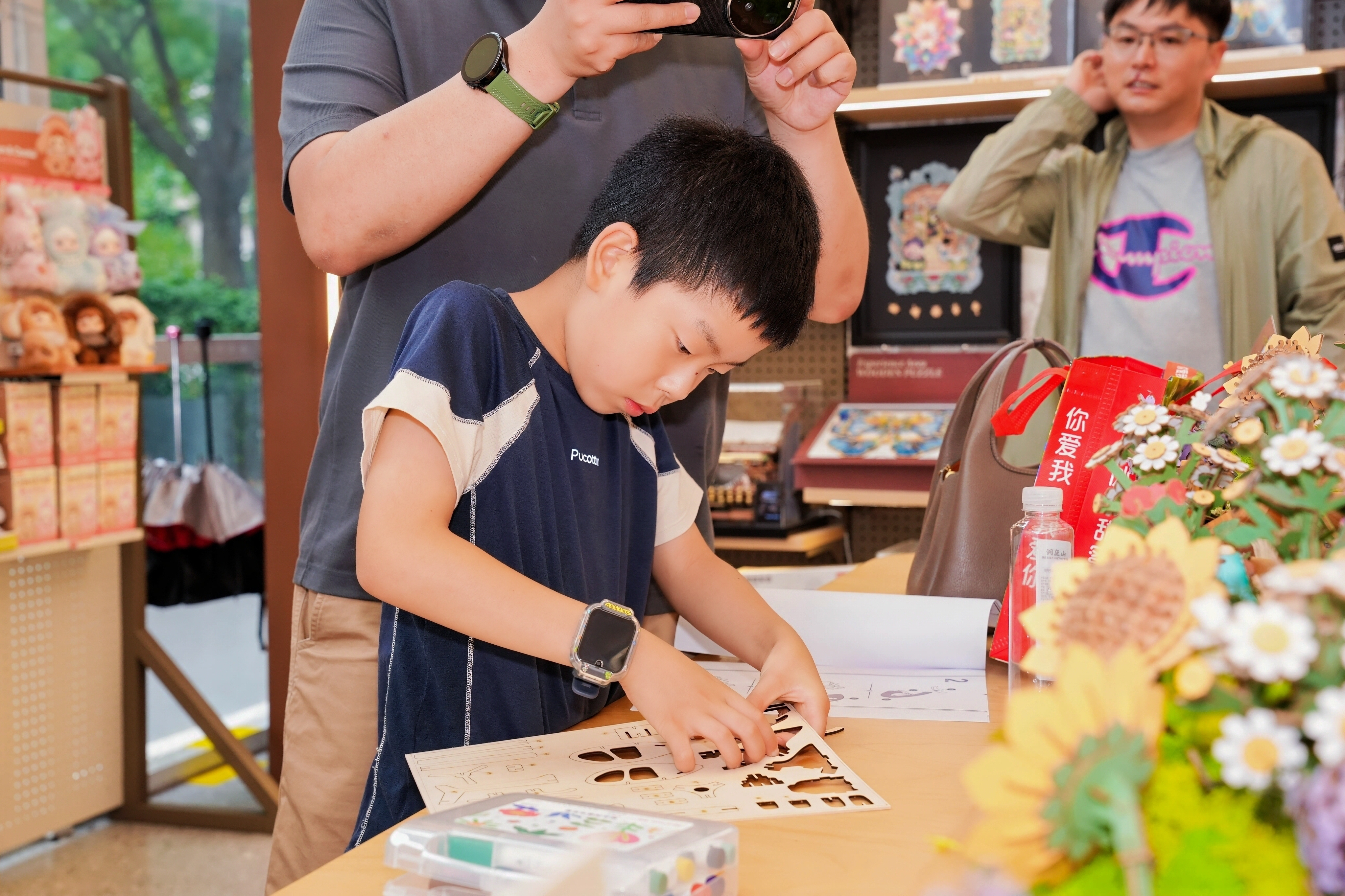 Child assembling the octopus model